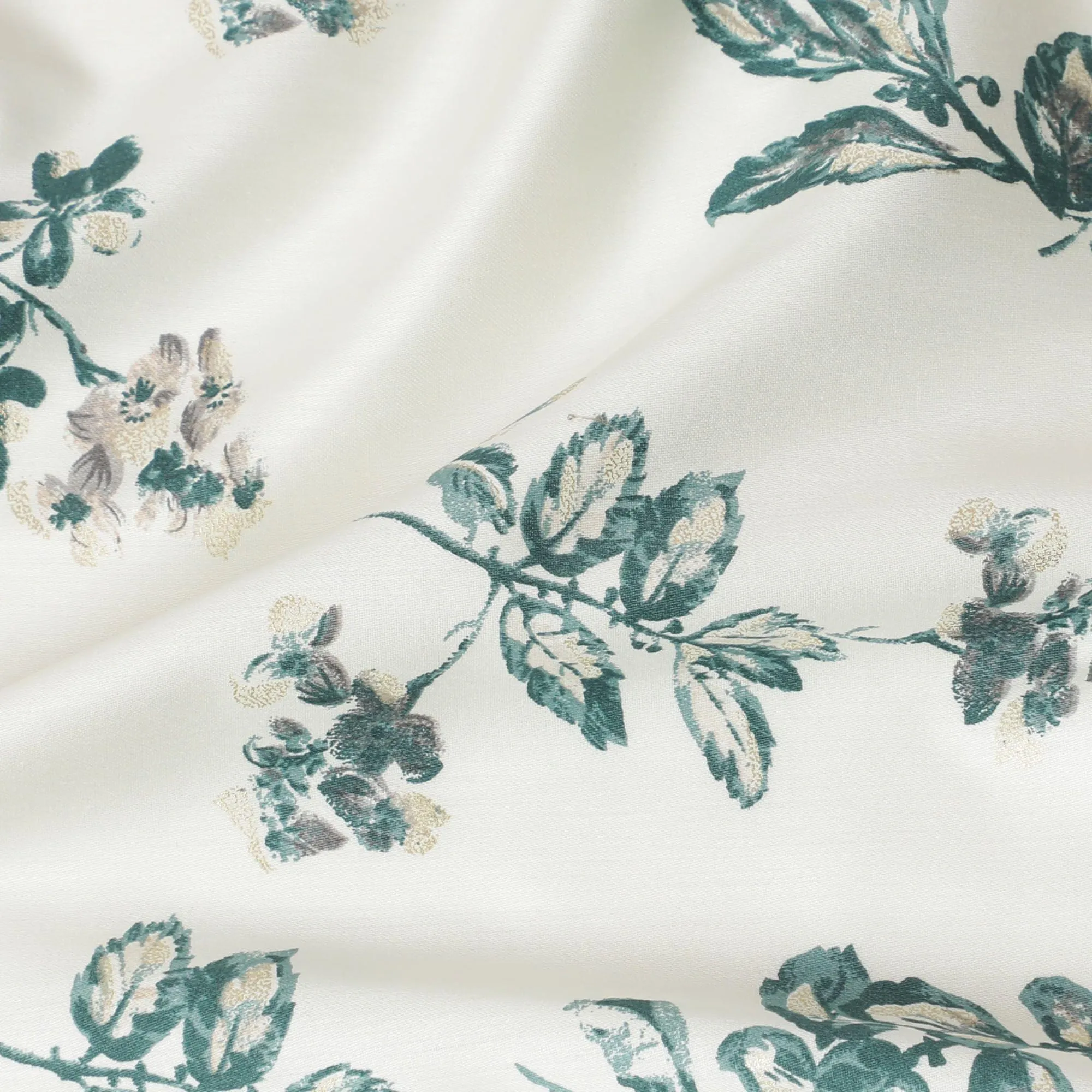 Cream cotton satin fabric with bottle green and gold print in floral design-D16419