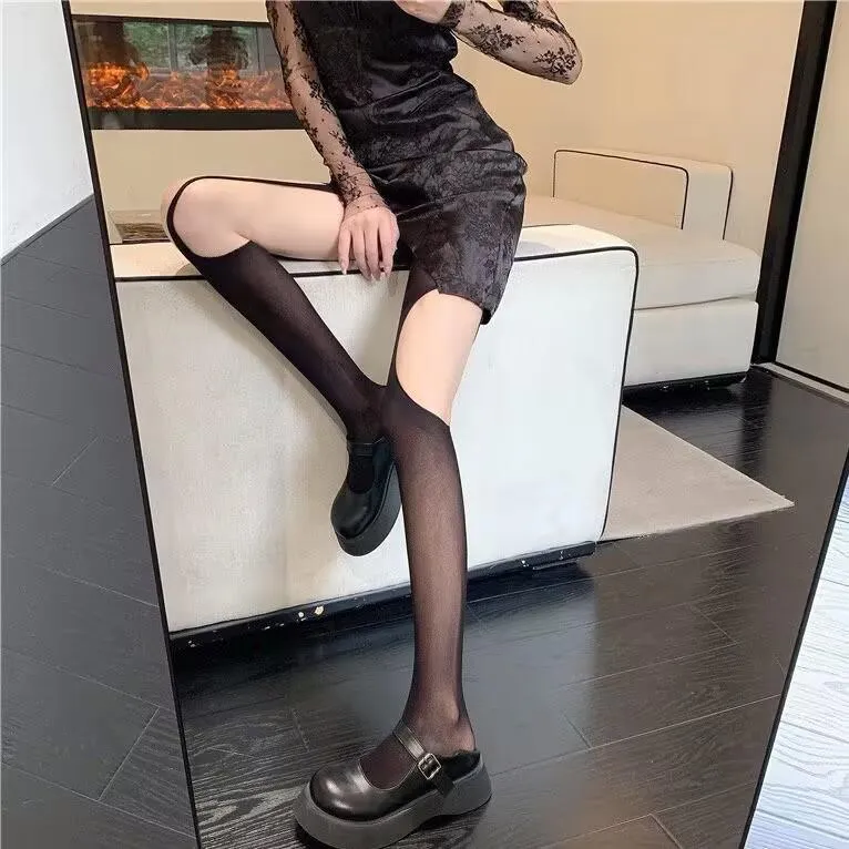 Irregular hollow out sheer mesh tights