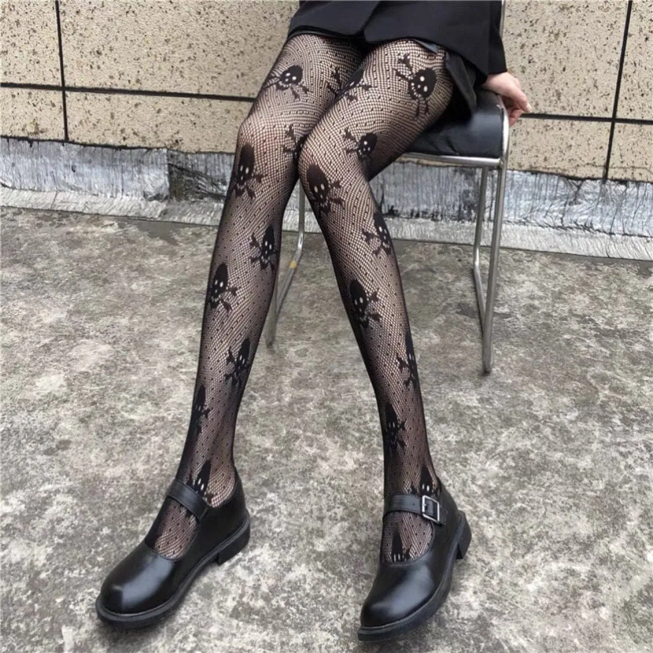 Star skull pattern fishnet tights